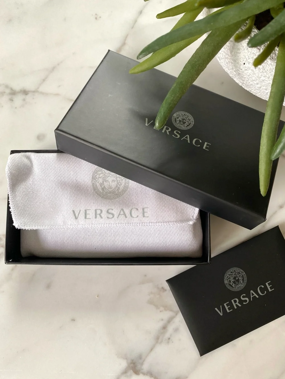 Versace blue leather